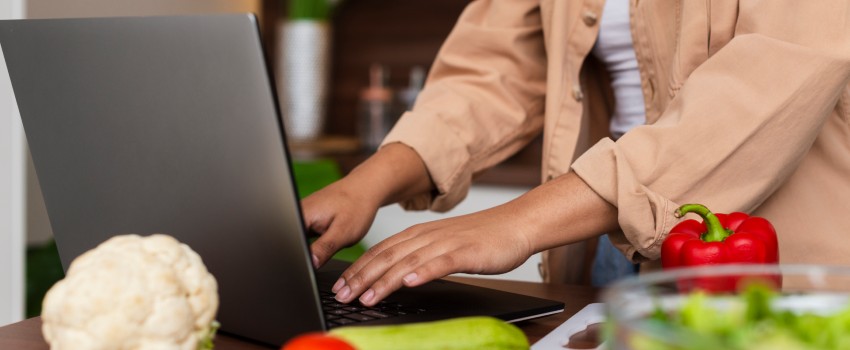 Person typing on laptop