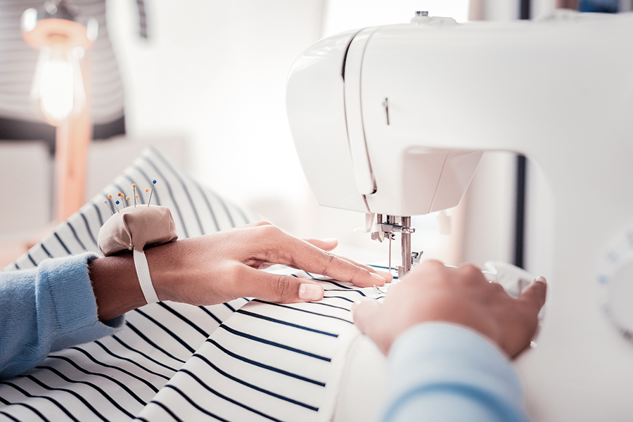 clothes being repaired by a sewing machine