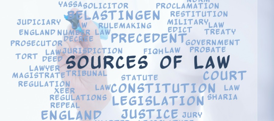 sources of law text being written on a board